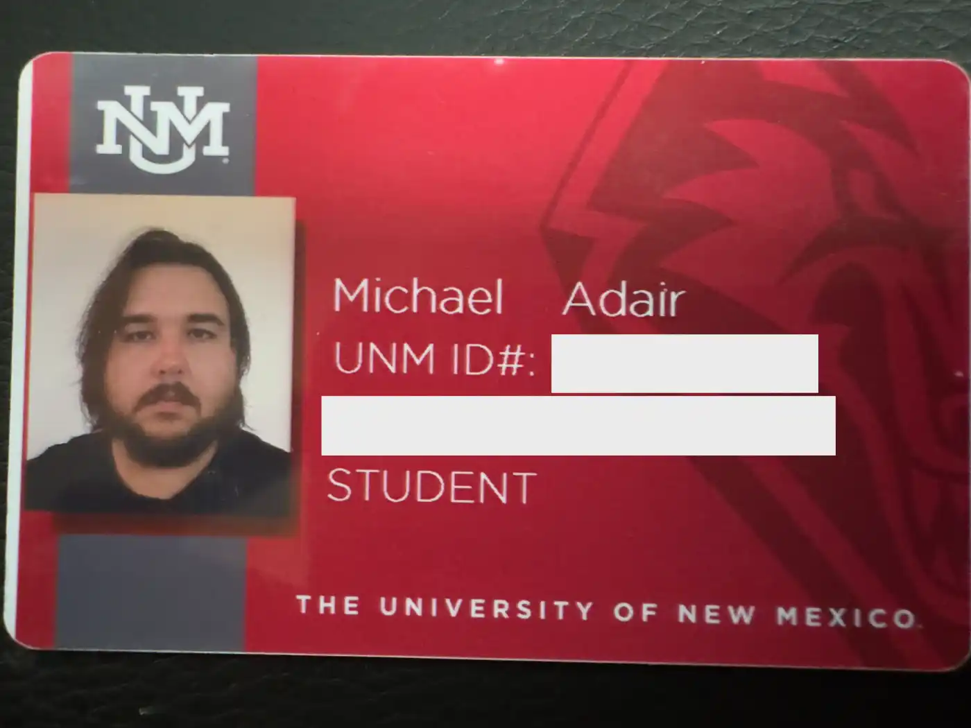 Mike's UNM Lobo ID card, numbers blurred.